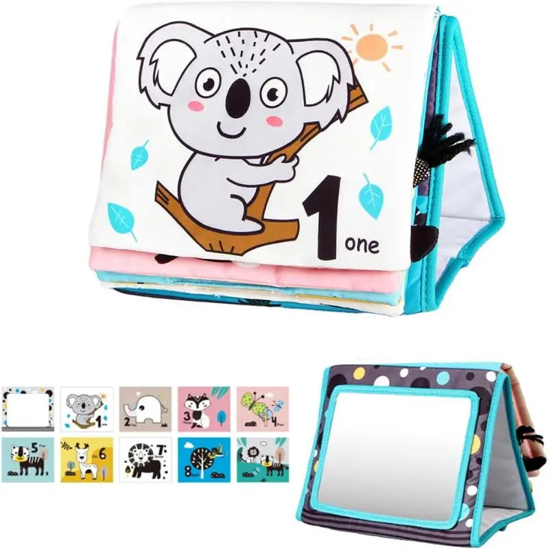 High-contrast crinkle cloth book with a baby face and a tummy time mirror.