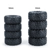 A set of black soft rubber tires, measuring 50mm and 54mm, stacked for RC crawler cars.