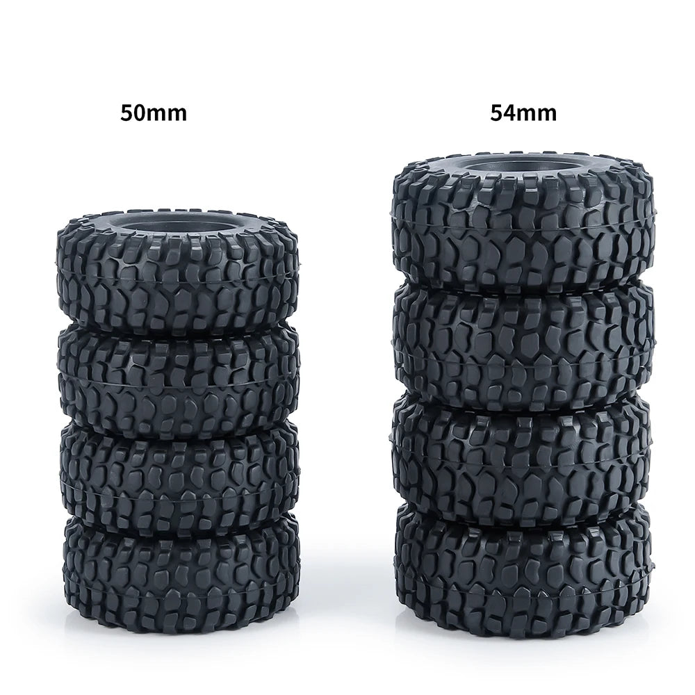 A set of black soft rubber tires, measuring 50mm and 54mm, stacked for RC crawler cars.
