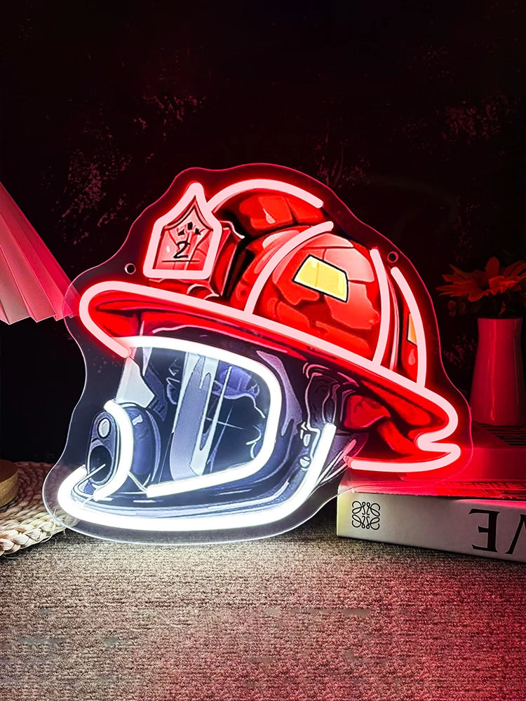 A red firefighter helmet neon sign with a clear visor and emblem, illuminated against a dark background.