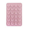 A pink reusable silicone suction cup phone mount with multiple suction cups for hands-free viewing.