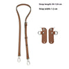 A set of brown leather mini bag straps with alloy buckles and adjustable lengths.