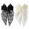 A pair of elegant lace bows in black and white for hair accessories