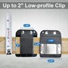A black clip-on tool belt holster with a silver tool insert shown next to a ruler.