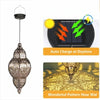 A decorative solar hollow-out lantern with a patterned glass shade, shown next to its charging mechanism and a close-up of it