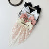 A bundle of elegant lace bows in pink and white are displayed against a light background.