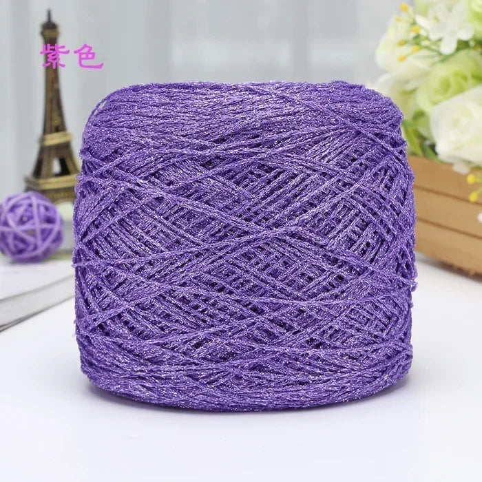 Purple metallic silk crochet yarn in a ball for knitting and macrame projects