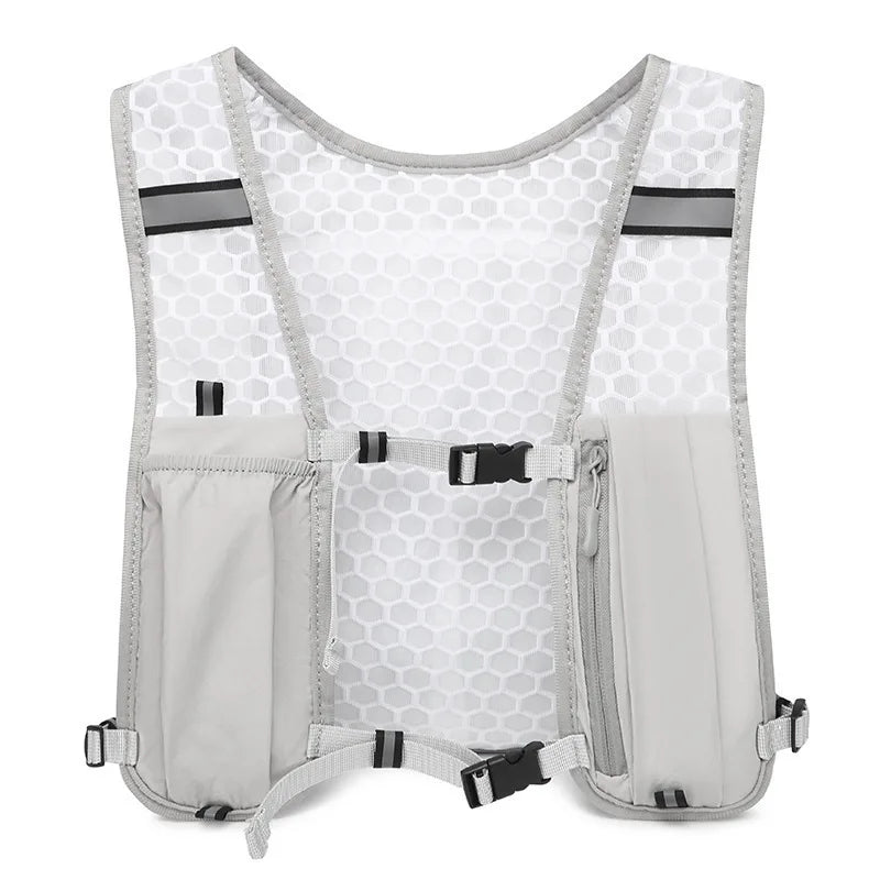 A gray lightweight hydration vest with a honeycomb mesh front and side pockets.