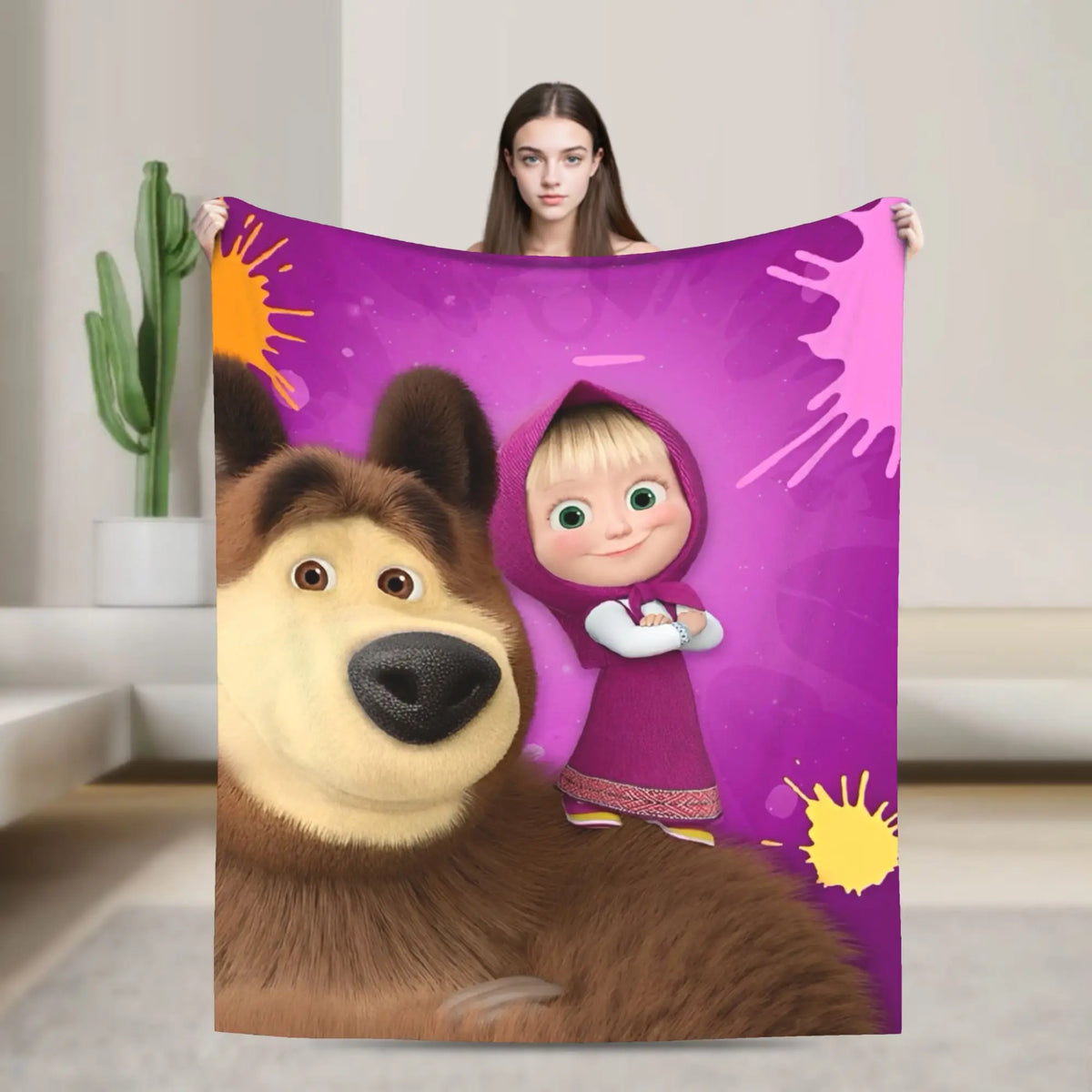 Flannel throw blanket featuring a cartoon design of Masha and Bear