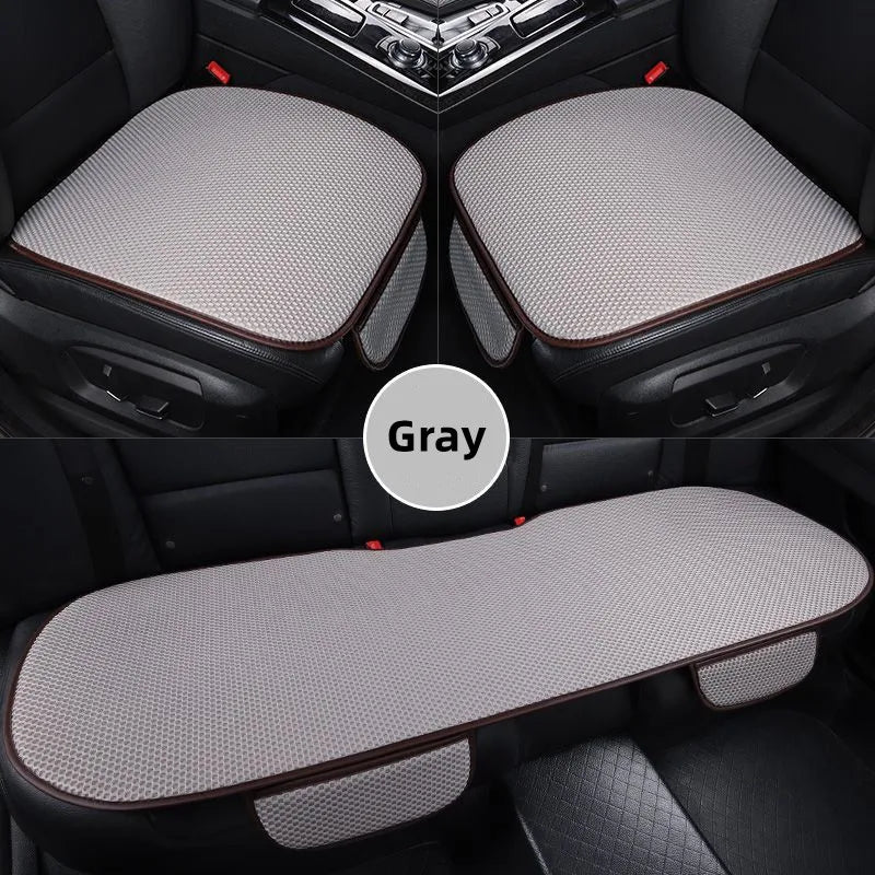 Gray breathable ice silk car seat cushion shown in a vehicle interior view.