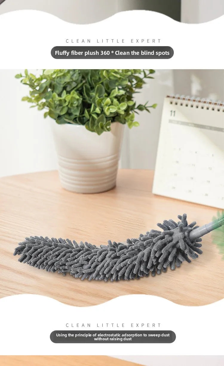 A gray microfiber duster is shown lying on a wooden surface, demonstrating electrostatic adsorption for cleaning.