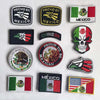 A collection of various Mexican themed patches and flags including an eagle skull, national flag, and various emblems.