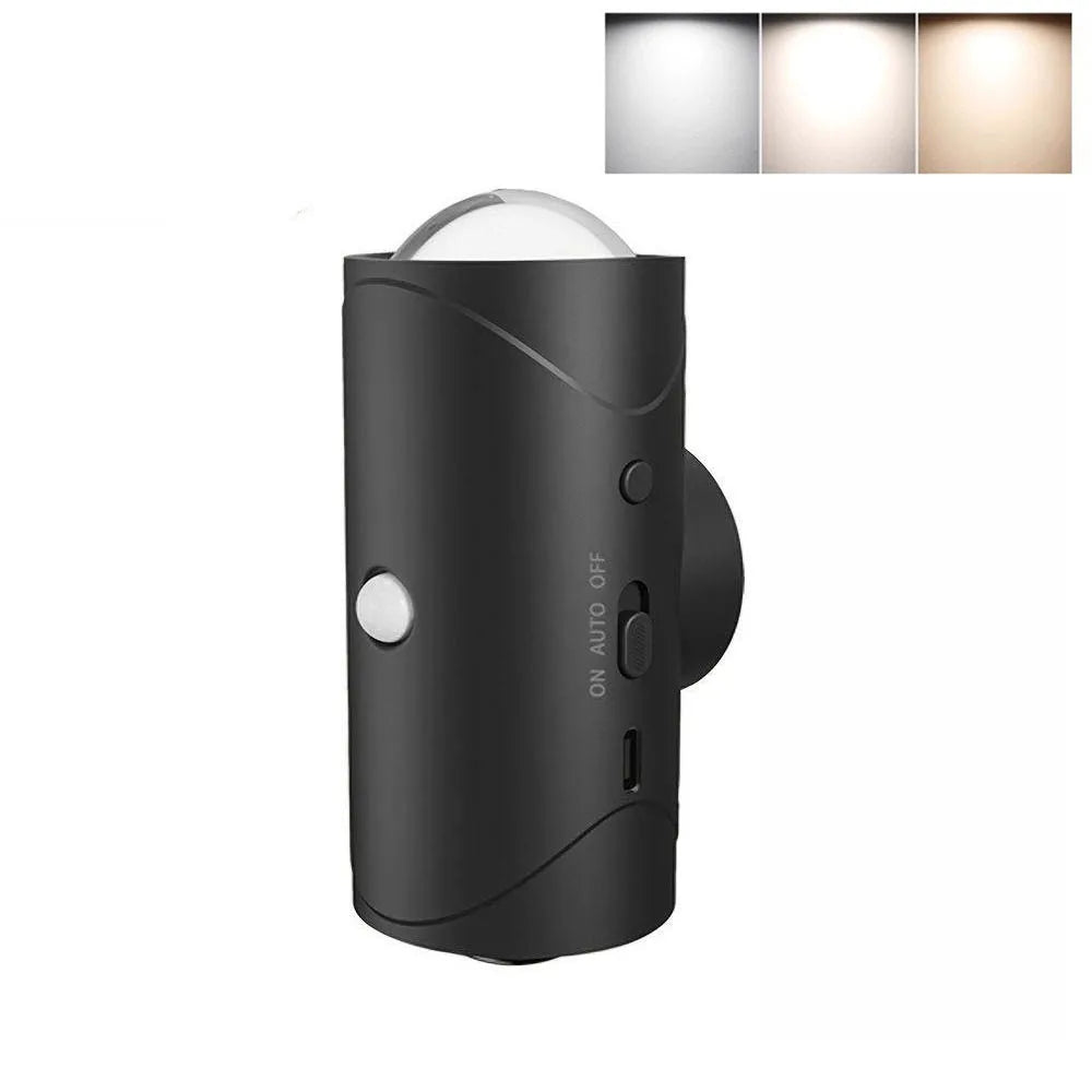 A black rechargeable motion sensor LED night light with adjustable brightness settings.