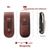 A brown leather folding knife case with a magnetic closure and decorative embossing.