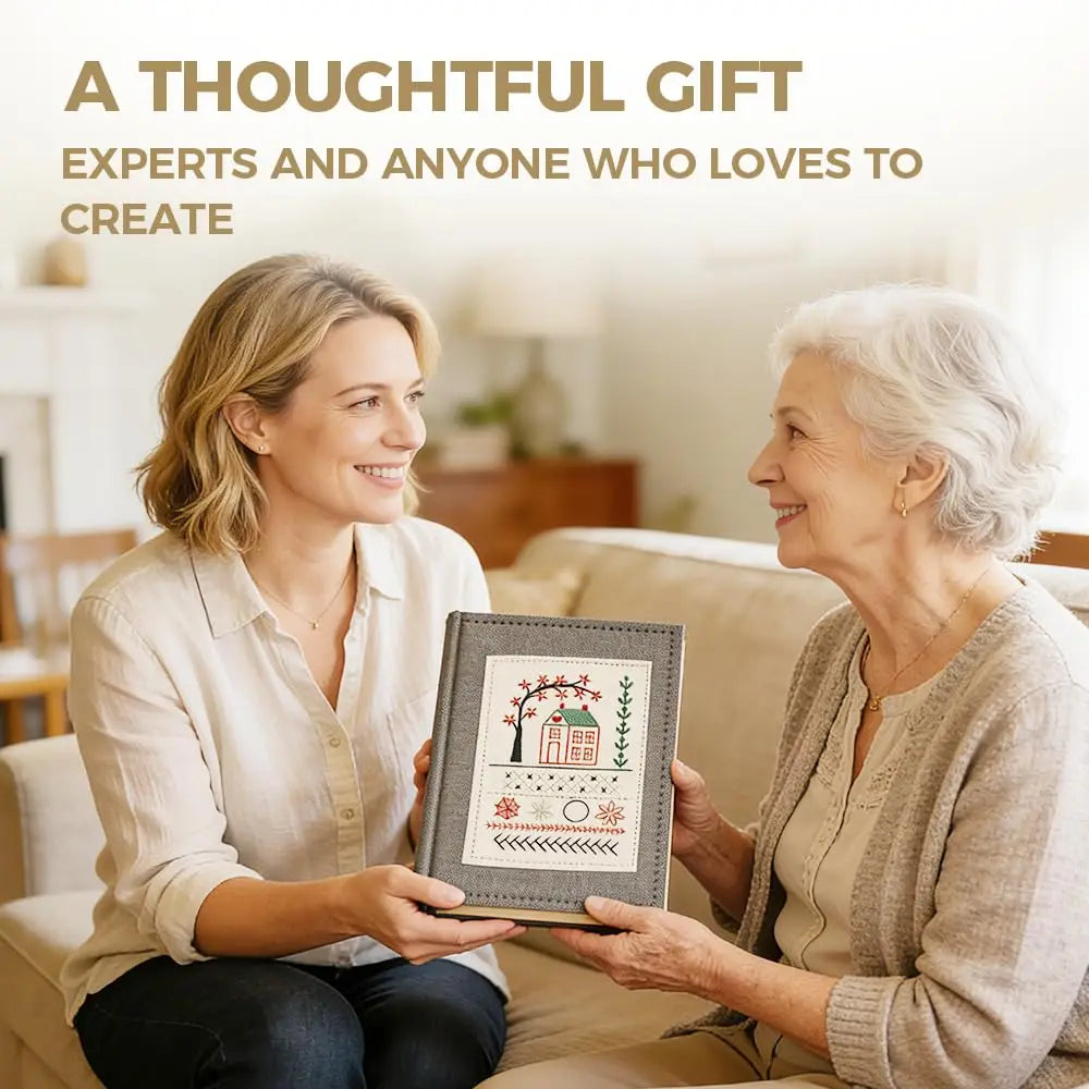 Two women smiling while looking at a framed guide for beginner's guide to creative hand embroidery stitches