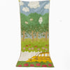 A towel featuring an embroidered cartoon forest scene with trees, clouds, and animals.