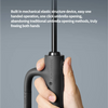 A hand is holding a black umbrella with a handle, demonstrating its one-hand operation.