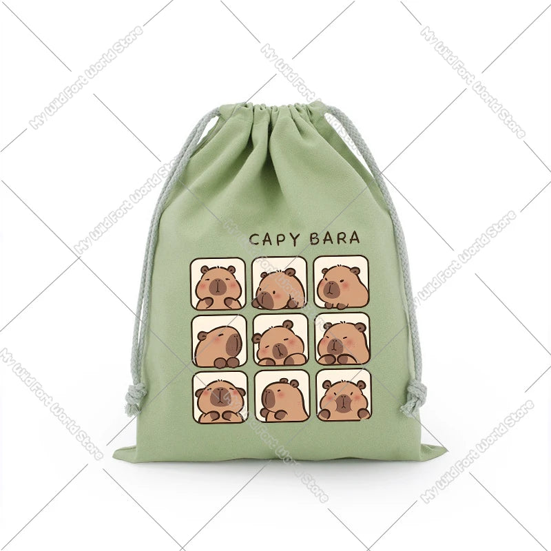 A light green drawstring storage bag featuring a repeating pattern of cute capybara faces.