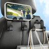 A black car seat phone holder with a mounted smartphone and organizer hooks.