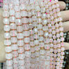 A hand holds a string of square faceted pink quartz beads for jewelry making