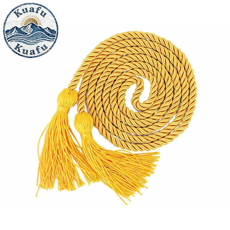 Yellow graduation honor cords with tassels coiled on a spool
