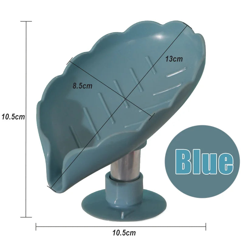Blue leaf-shaped suction cup soap dish with a self-draining tray and measuring lines.
