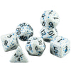A set of seven polyhedral dice including d10s, d8s, d6s, and d4s, scattered on a white background.