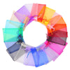 A circular display of assorted organza drawstring gift bags in various bright and pastel colors.