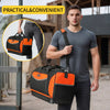 A man holds an orange and black heavy-duty tool bag with a molded base and 18 pockets in an outdoor construction setting.