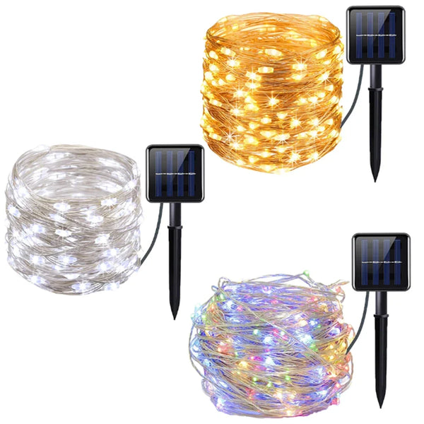 Three strands of solar-powered LED string lights in gold, silver, and purple glow.