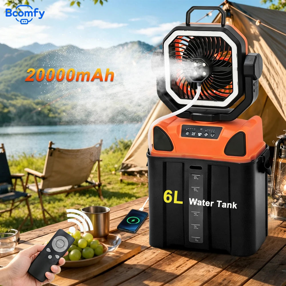 An orange portable misting fan with a black battery pack and 6L water tank is shown outdoors on a wooden table.