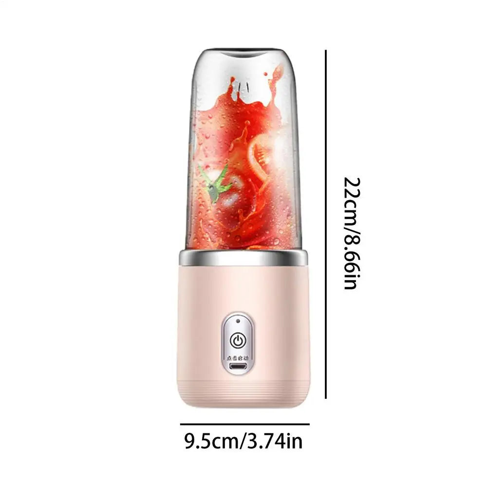 A portable USB rechargeable personal blender with a pink base and a clear container filled with red liquid.