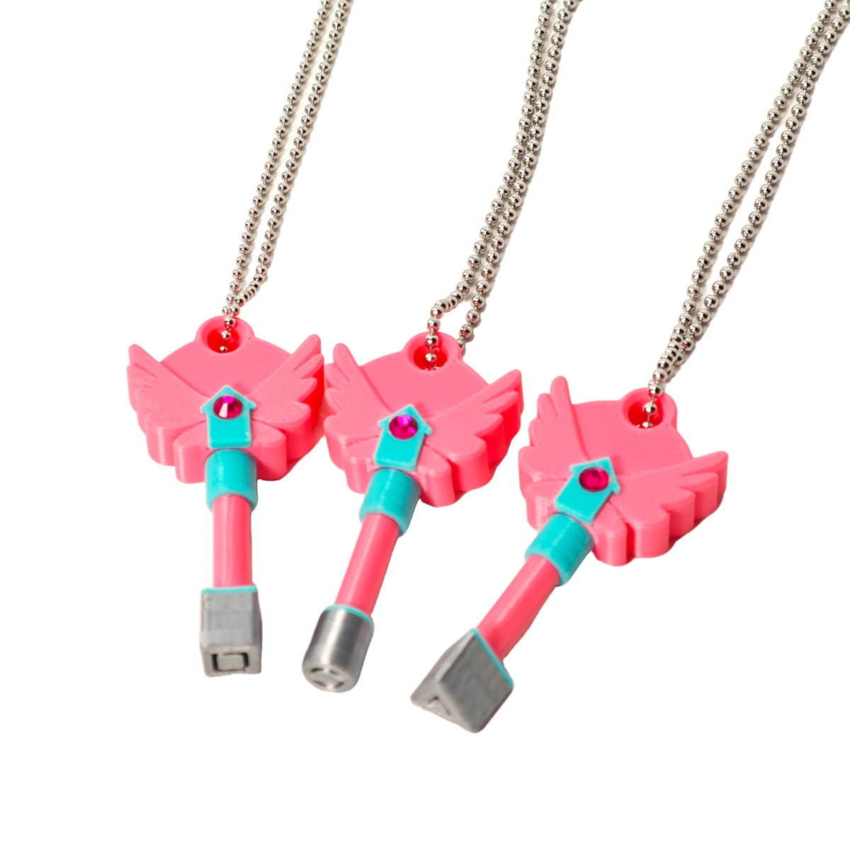 Set of four pink dagger key necklaces with silver chains and teal accents