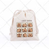 A beige drawstring storage bag featuring multiple cute capybara embroidered patches.
