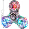 A clear plastic LED glow fidget spinner with multiple colored lights and a central rotating mechanism.