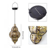 A hanging solar lantern with a decorative glass shade and a solar panel top.