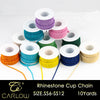 Rolls of multi-color glass rhinestone cup chain beads in various shades and colors