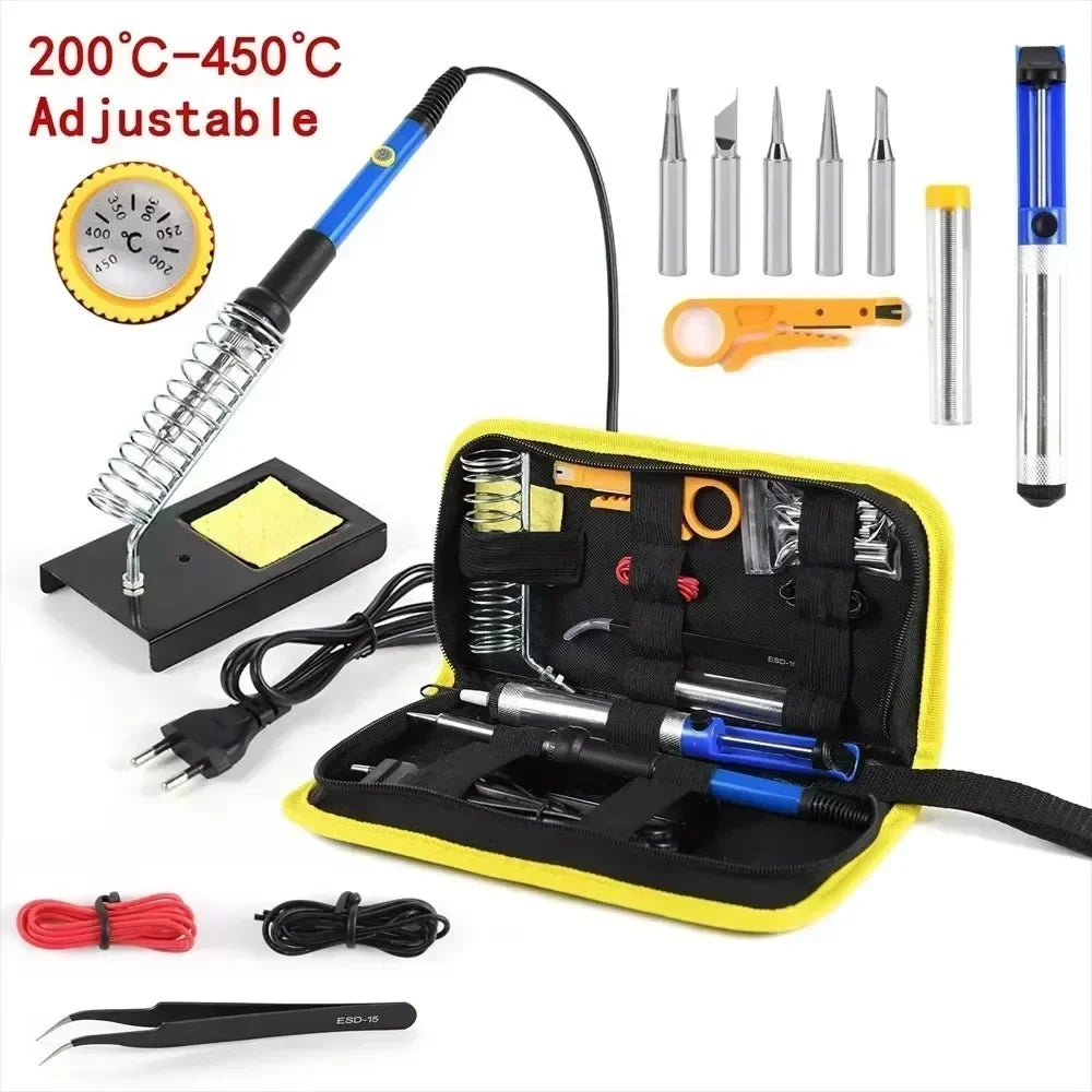 A yellow soldering iron kit with an adjustable temperature dial, various tips, and a multimeter tool.
