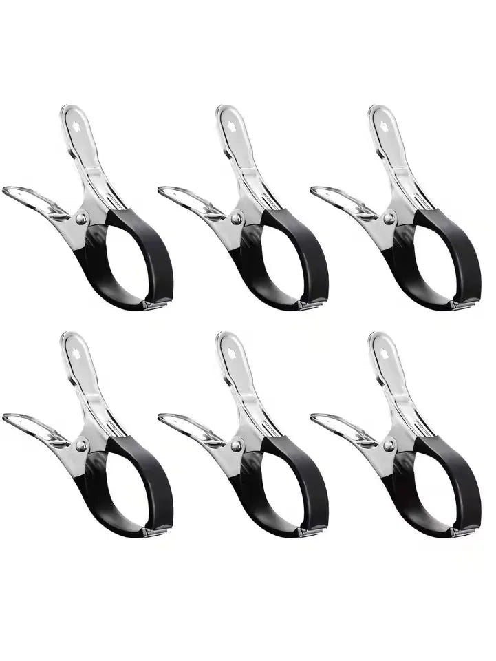 Six stainless steel pool cover clips with comfort grip handles in black.