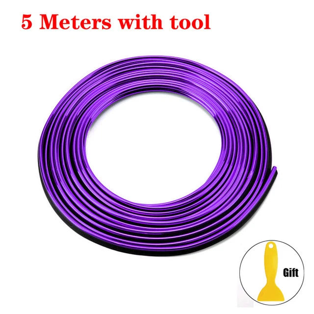 Purple flexible car interior trim strips coiled with a tool.