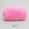A ball of bright pink 4-ply milk cotton yarn for knitting and crochet.