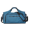 A blue water-resistant duffel bag with a shoulder strap and a front shoe pocket.