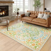 Vintage floral soft area rug featuring green and orange botanical patterns in a living room setting.