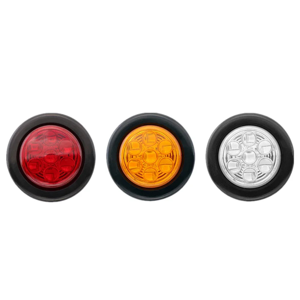 Three round flush mount LED tail lights in red, amber, and clear lenses for trucks, trailers, and RVs