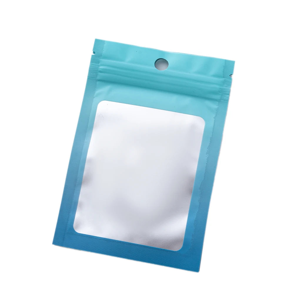 A clear window ziplock pouch in light blue plastic with a white interior, packaged for resale.