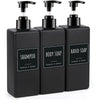 A three-pack of black refillable soap dispenser bottles with labels for shampoo, body soap, and hand soap.