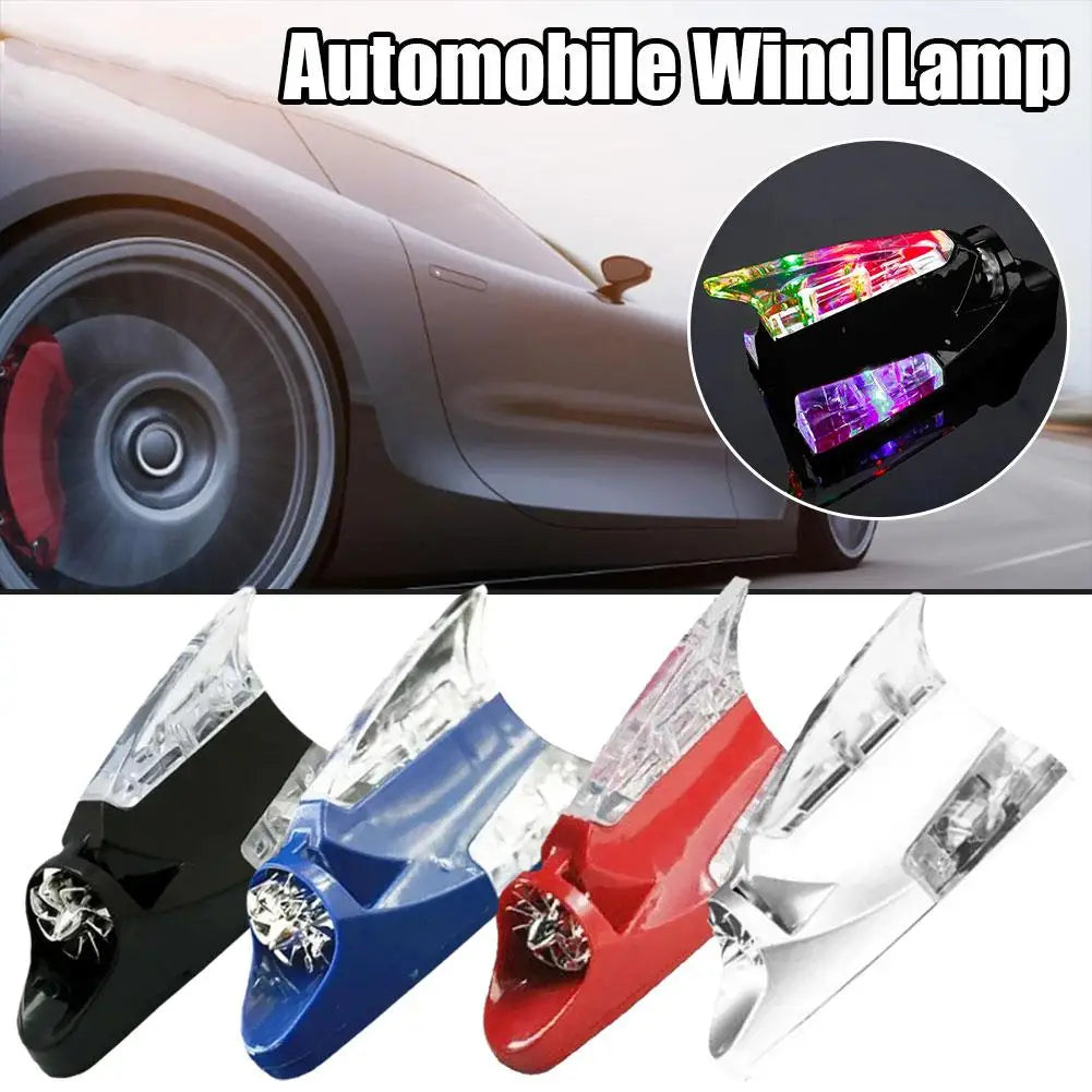 A collection of wind-powered LED antenna lights in black, blue, red, and clear plastic for vehicles.