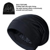 A black silk satin sleep bonnet shown in a draped form.