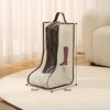 A tall boot storage bag organizer with a brown and beige color scheme is displayed on a light rug.