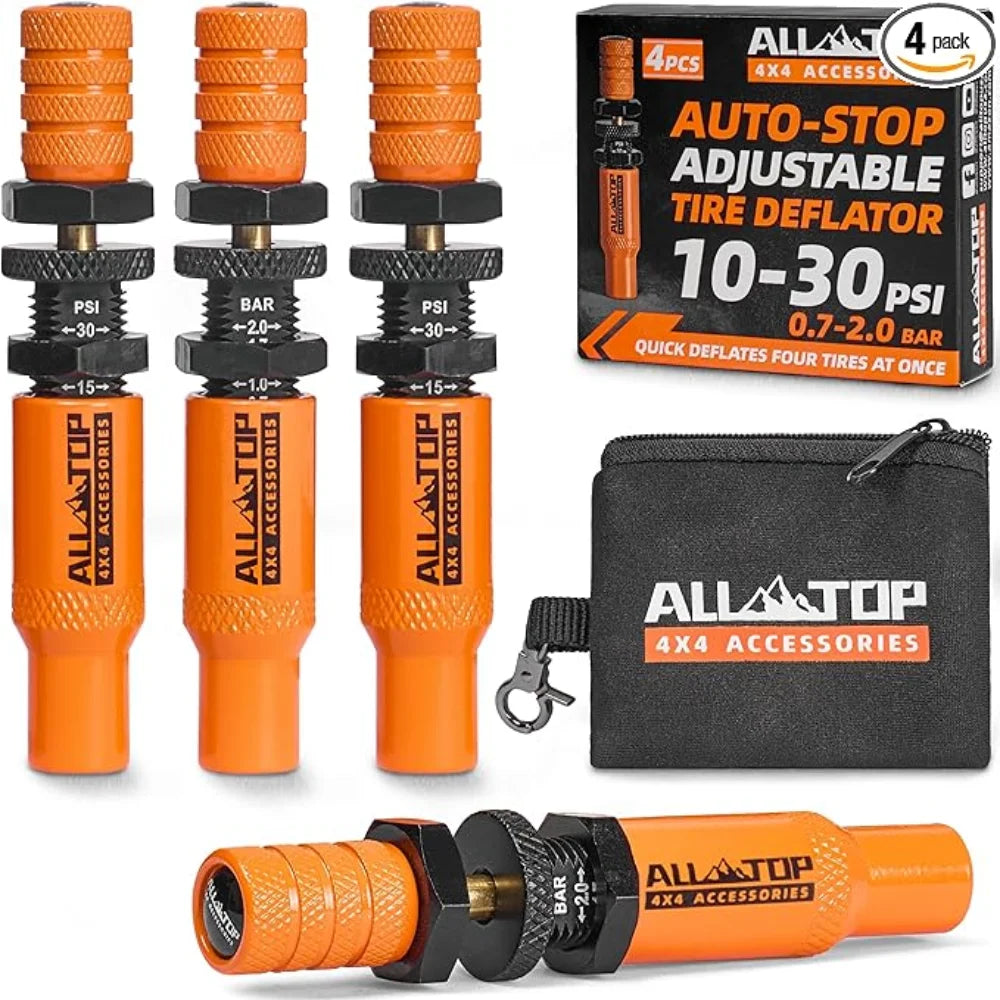 A set of four orange and black auto-stop adjustable tire deflators for 4x4 accessories.